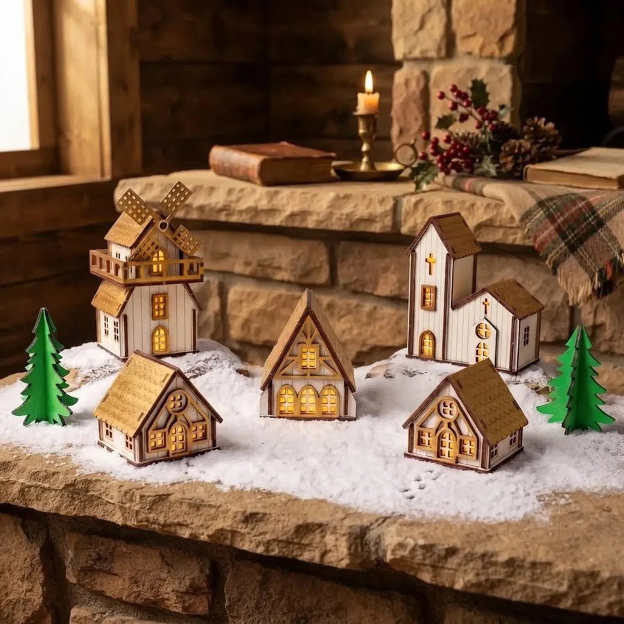 Vila Natalina dourada em madeira sobre a lareira com neve decorativa
